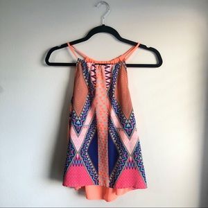 Sleeveless open back geo print blouse